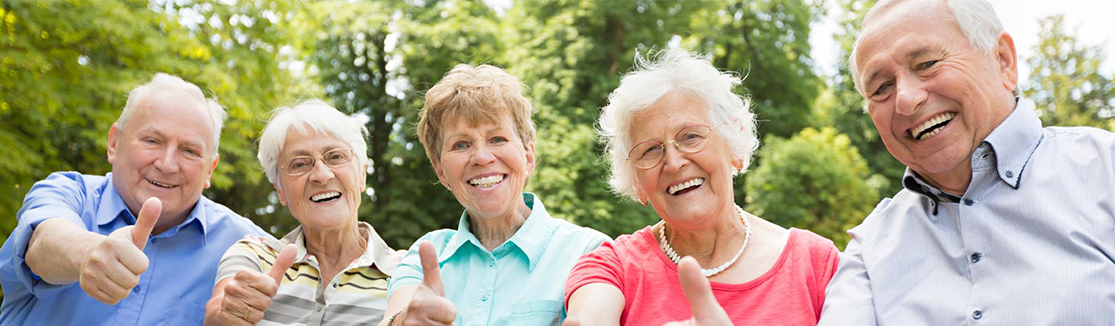 Seniors showing thumb ups