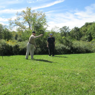 Two senior man playing game outside