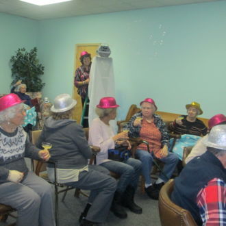 Group of seniors in party hats